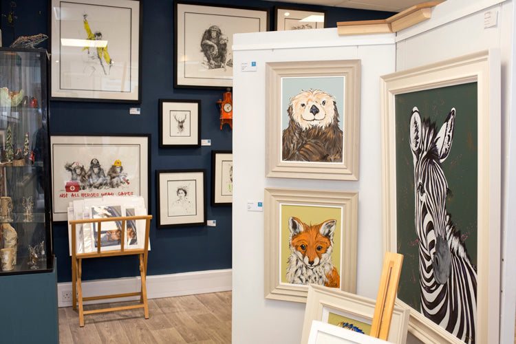 Framed artwork displayed at Primrose Gallery