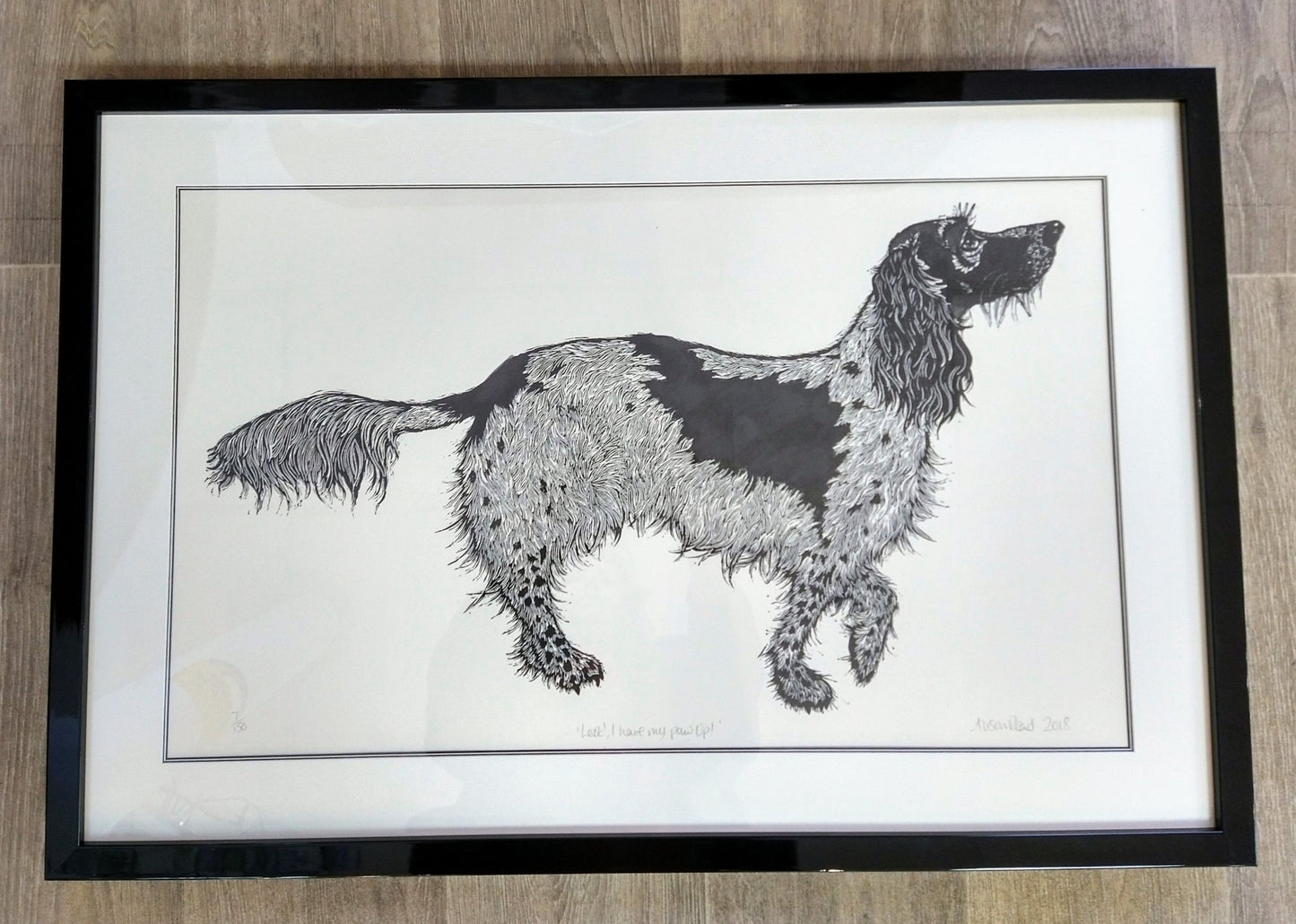 Alison Read- Original lino cut of a dog holding paw up- "Look I Have My Paw Up"