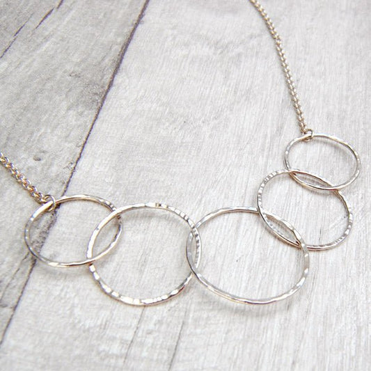 Zoe Ruth- Silver and Open Five Ring Necklace