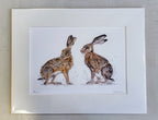 Anne Gilbert - Den and Daisy Hares, Mounted limited Edition Print - Primrose Gallery and Framing 