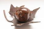 Hibernating Dormouse on Maple Leaf by Helen Lopez — close-up of the sleeping dormouse