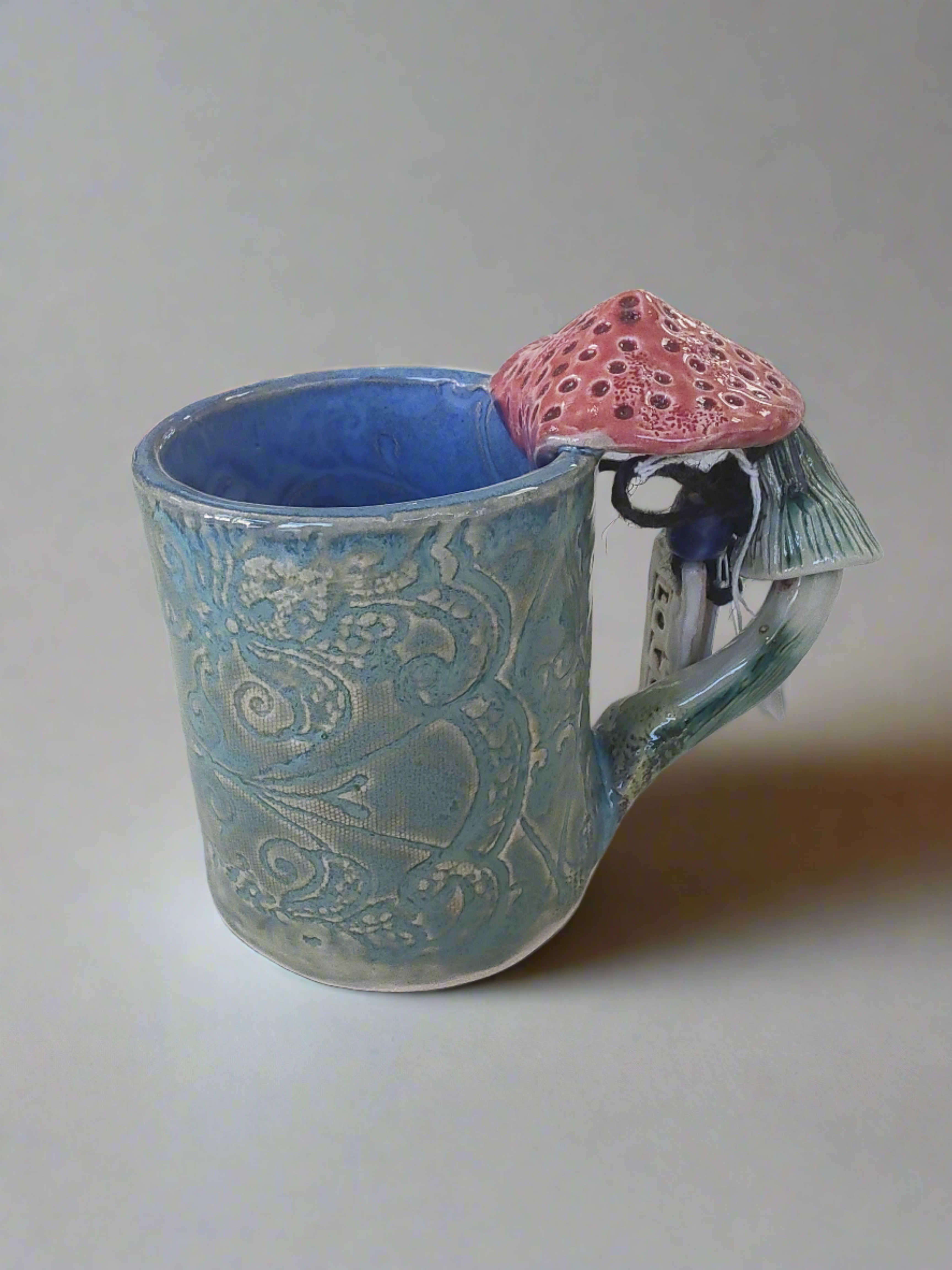 Marika Du Plessis- Toadstool Coffee Mug, Green - Primrose Gallery and Framing 