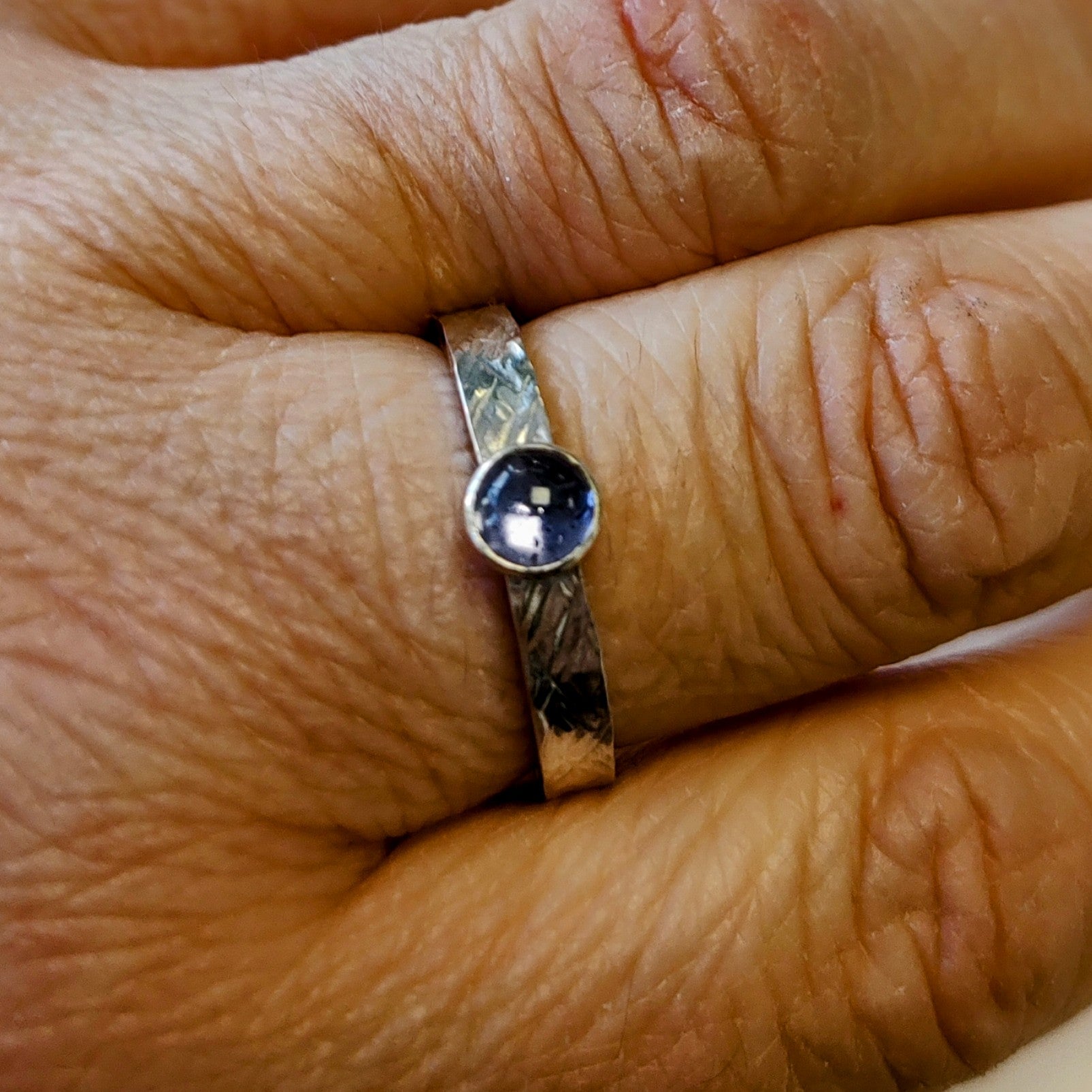 Zoe Ruth- Silver Wide Hammered Pale Lolite Ring size Q - Primrose Gallery and Framing 