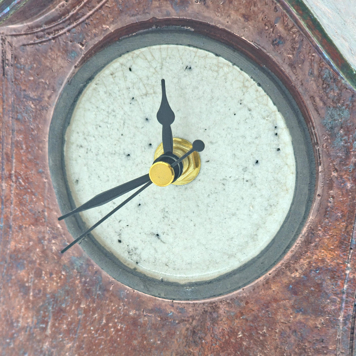 Copper A raku clock — mouse on the right, view 6