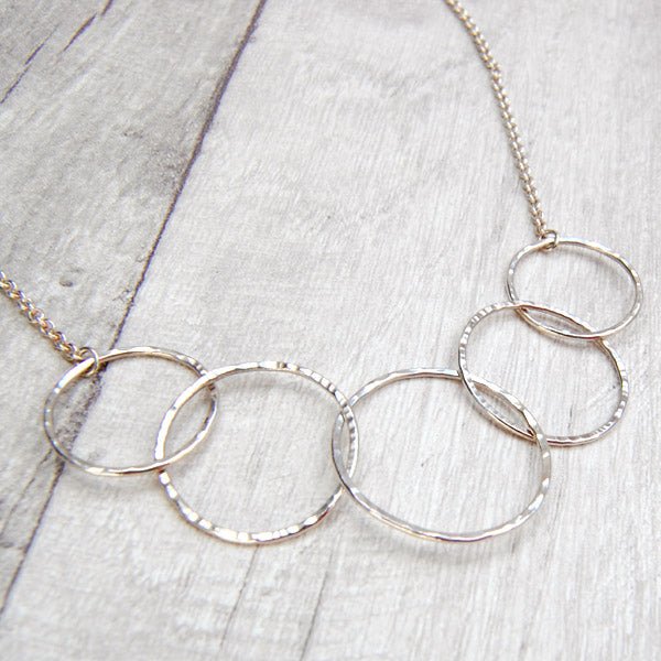 Zoe Ruth- Silver and Open Five Ring Necklace